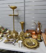 Large quantity of brassware including chambersticks, candlesticks, door stop,