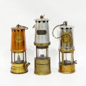 The Protector Lamp and Lightning Co Ltd type 6 miner's lamp and two others (3)