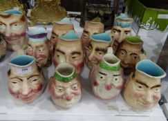 Collection of character jugs including Sarreguemines (11)