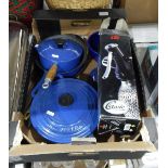 Blue Le Creuset casserole dish, lidded saucepan and another cast iron pan, a boxed soda syphon,