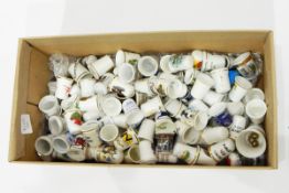 Quantity of decorative china ceramic thimbles including commemorative, souvenir, etc.