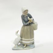 Lladro figure of a duck girl,