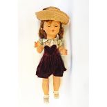 Composition walking doll, sleep eyes, open rose bud mouth, brown hair with bunches,