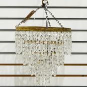 Four-tier gilt metal and cut glass ceiling lustre