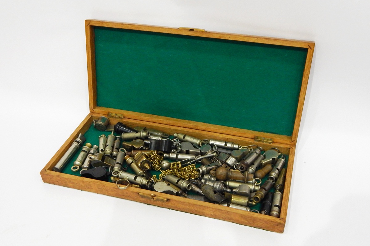 Parquetry inlaid oak box containing collection of old whistles including old police whistles,