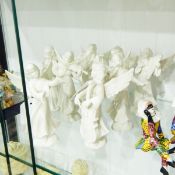 Group of Continental porcelain figures of angel musicians (8)