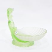 Moulded green glass shell-shaped dish on mermaid-pattern stand,