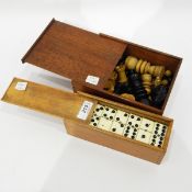 Set of ebony and bone dominoes and a collection of boxwood and ebony chess pieces