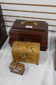 Reproduction Georgian-style mahogany tea caddy with fitted interior,