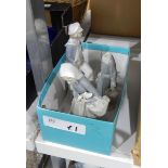 Three Lladro figure groups, one of a girl with ducklings in a basket, 23cm high (damaged),