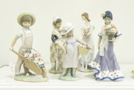 Various Lladro figures to include boy with wheelbarrow and girls with flowers (5)