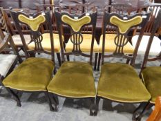 Set of four Edwardian dining chairs on cabriole shaped legs,