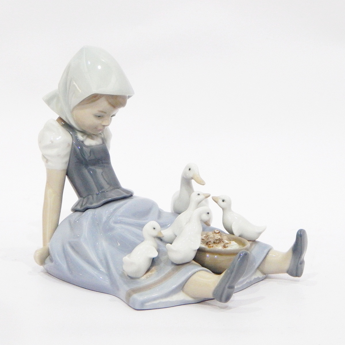 Porcelain figure of a seated girl with ducklings and another girl with turkey - Image 2 of 3