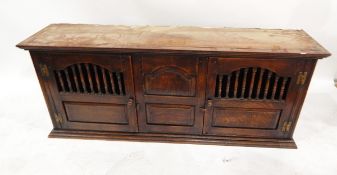 Reproduction 17th/18th century style oak food cupboard enclosed by two doors with turned spindle