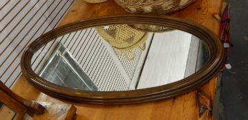 Mid 20th century oval moulded mahogany-framed wall mirror