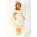 Large composition walking doll, sleep eyes, open mouth with blonde ringlet wig,