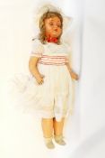 Large composition walking doll, sleep eyes, open mouth with blonde ringlet wig,