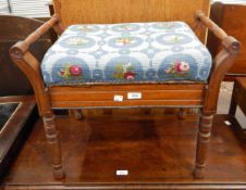 Edwardian box-seat piano stool on turned supports and with woolwork embroidered pad seat