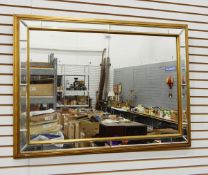 Giltwood contemporary wall mirror, rectangular with inner slip and bevel cut sections,