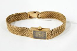 Lady's 9ct gold Omega bracelet watch with square dial,