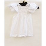 Gros grain cotton child's dress/coat embroidered with cotton ribbon detail,