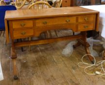 20th century Cotswold made oak drop-leaf writing table having framed panel top, drop ends,