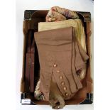 Pair of woollen gaiters, a cushion cover with oriental-style applique pieces,