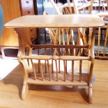 Ercol elm coffee table/magazine rack,