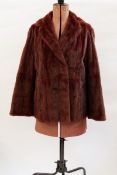 Two squirrel fur jackets, one dyed deep chestnut colour,