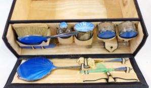 Leather dressing case containing silver, plated and blue guilloche enamel fittings, London 1928,