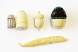 19th century ivory sander carved in the form of an acorn with pierced internal cover,