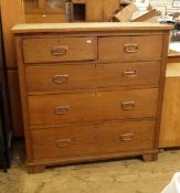 Arts & Crafts style oak chest of two short and three long graduated drawers,