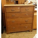 Arts & Crafts style oak chest of two short and three long graduated drawers,