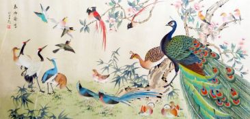 Chinese school (20th century) Watercolour on silk Peacocks and other exotic birds amidst blossom,