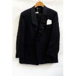 Gentleman's dinner suit with satin shawl collar and braid seam to trousers,