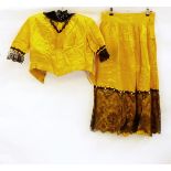 Child's dressing up outfit with yellow satin skirt trimmed with jet beads and black lace and a