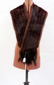 Dark mink stole with mink tail tassels