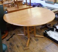 Ercol elm oval drop-leaf dining table with central quadruple panelled square section supports