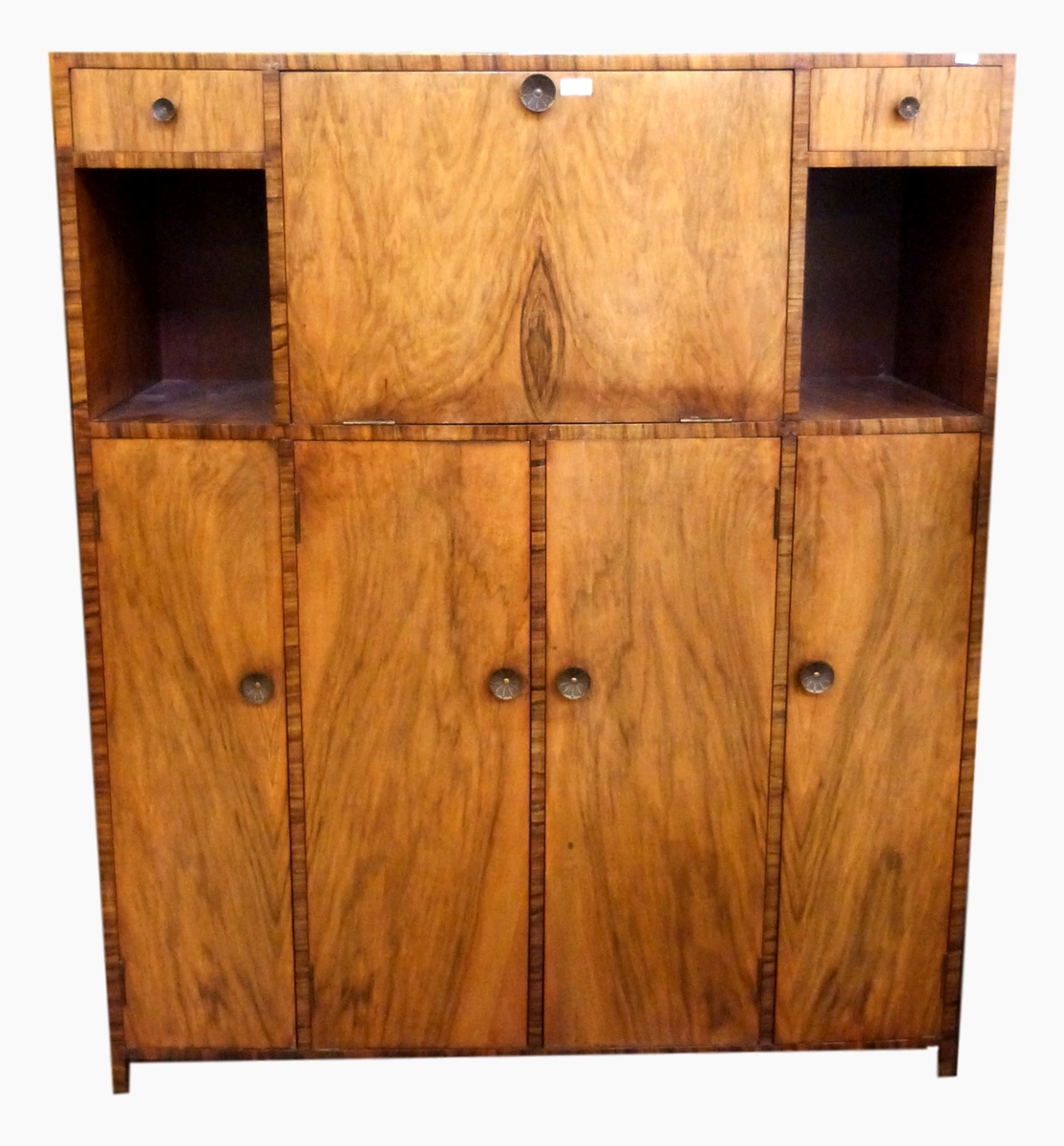 Early 19th century figured walnut cocktail/entertainment cabinet having central cocktail cabinet