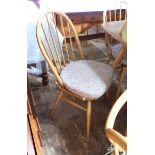Set of Six Ercol elm and beech dining chairs, rounded railback with seat cushions,