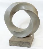 Contemporary grey composite circular twisted sculpture, on grey plinth,