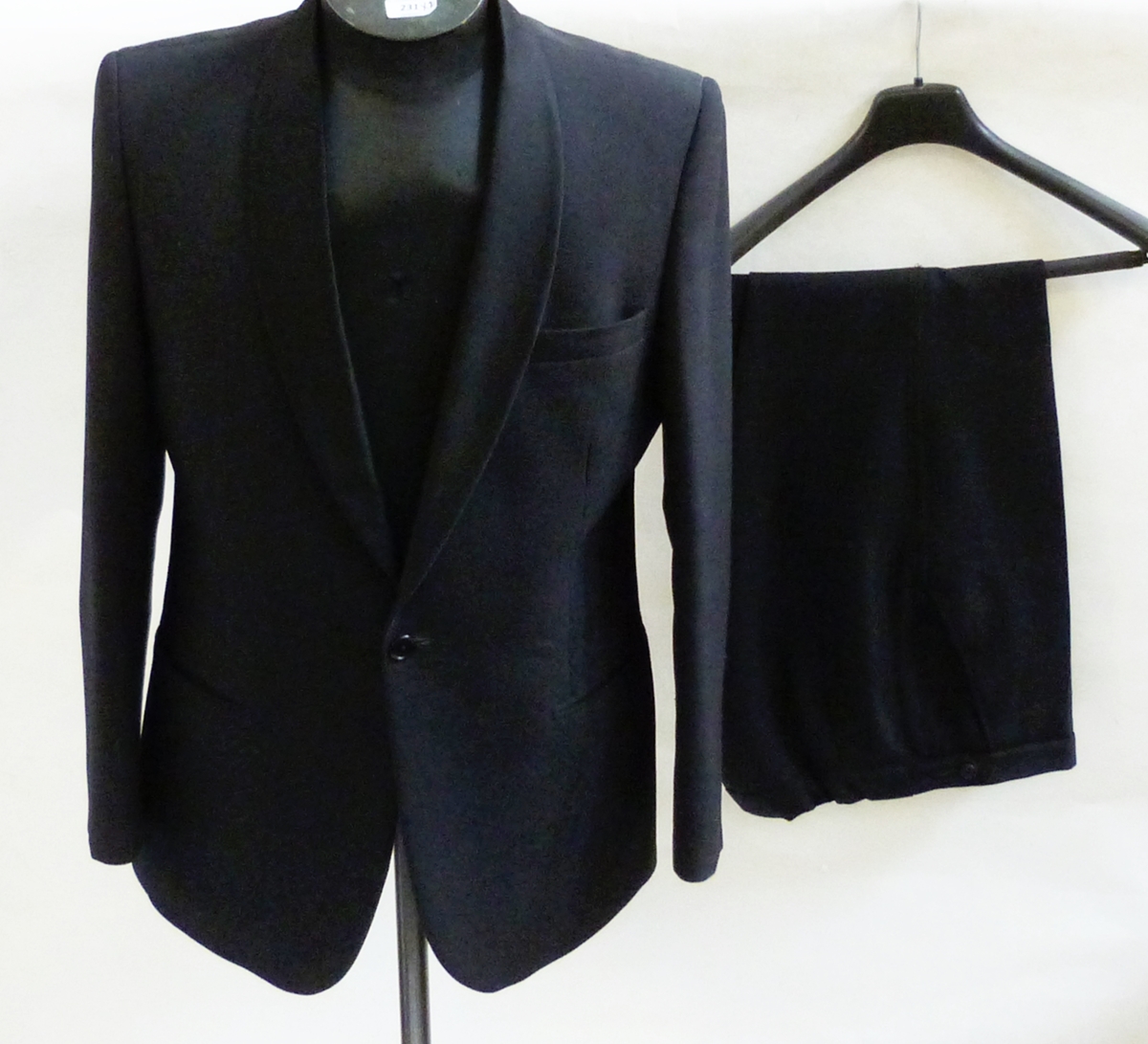 Gentleman's dinner jacket made by Canda with satin shawl collar, a David Moss cream evening jacket,