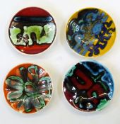 Four Poole Delphis pottery circular trinket dishes, model no.