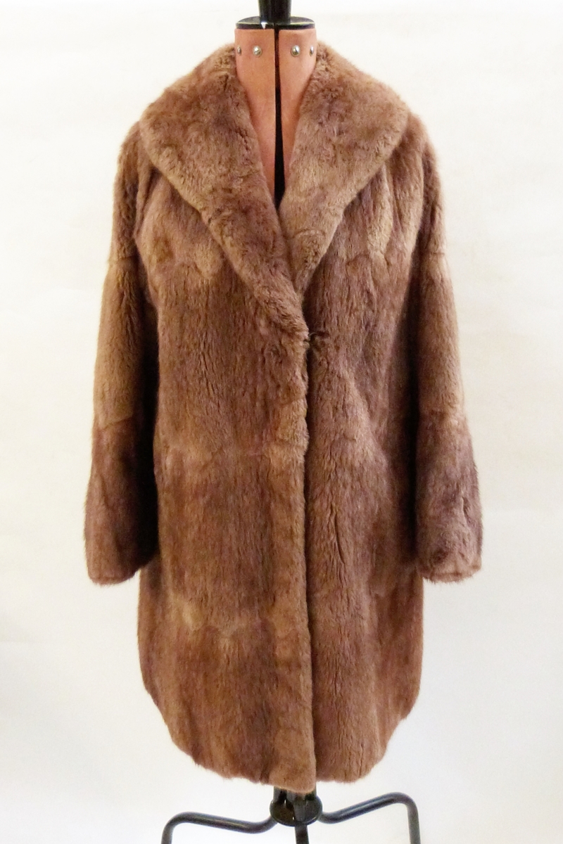 Various vintage fur items including a mink jacket, a mink stole, an ermine cape, another,