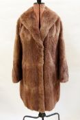 Various vintage fur items including a mink jacket, a mink stole, an ermine cape, another,