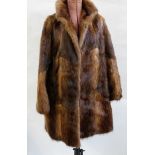 Vintage fur coat together with a fox scarf bearing its head (2)