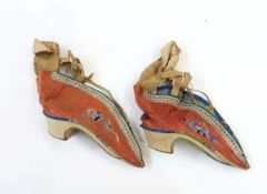 Pair of Oriental silk embroidered shoes for bound feet and a pair of Eastern-style leather shoes