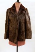 Mink stole with brown satin lining