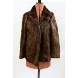 Mink stole with brown satin lining