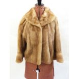 Short swing mink jacket with bracelet bell sleeves and a mink stole (2)